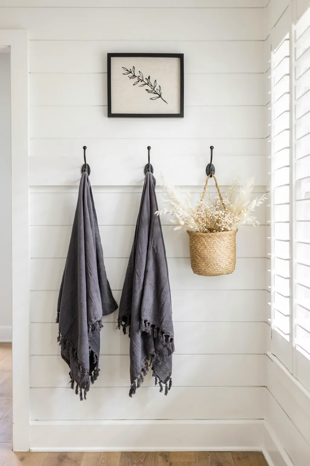 Black Hooks on Bright Shiplap