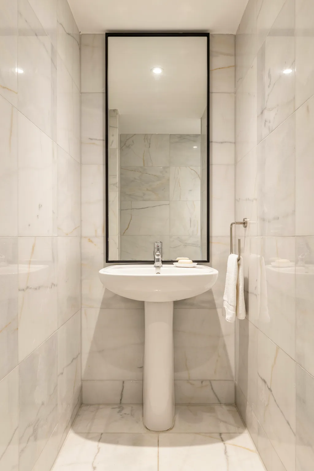One Tall Mirror Doubles The Room