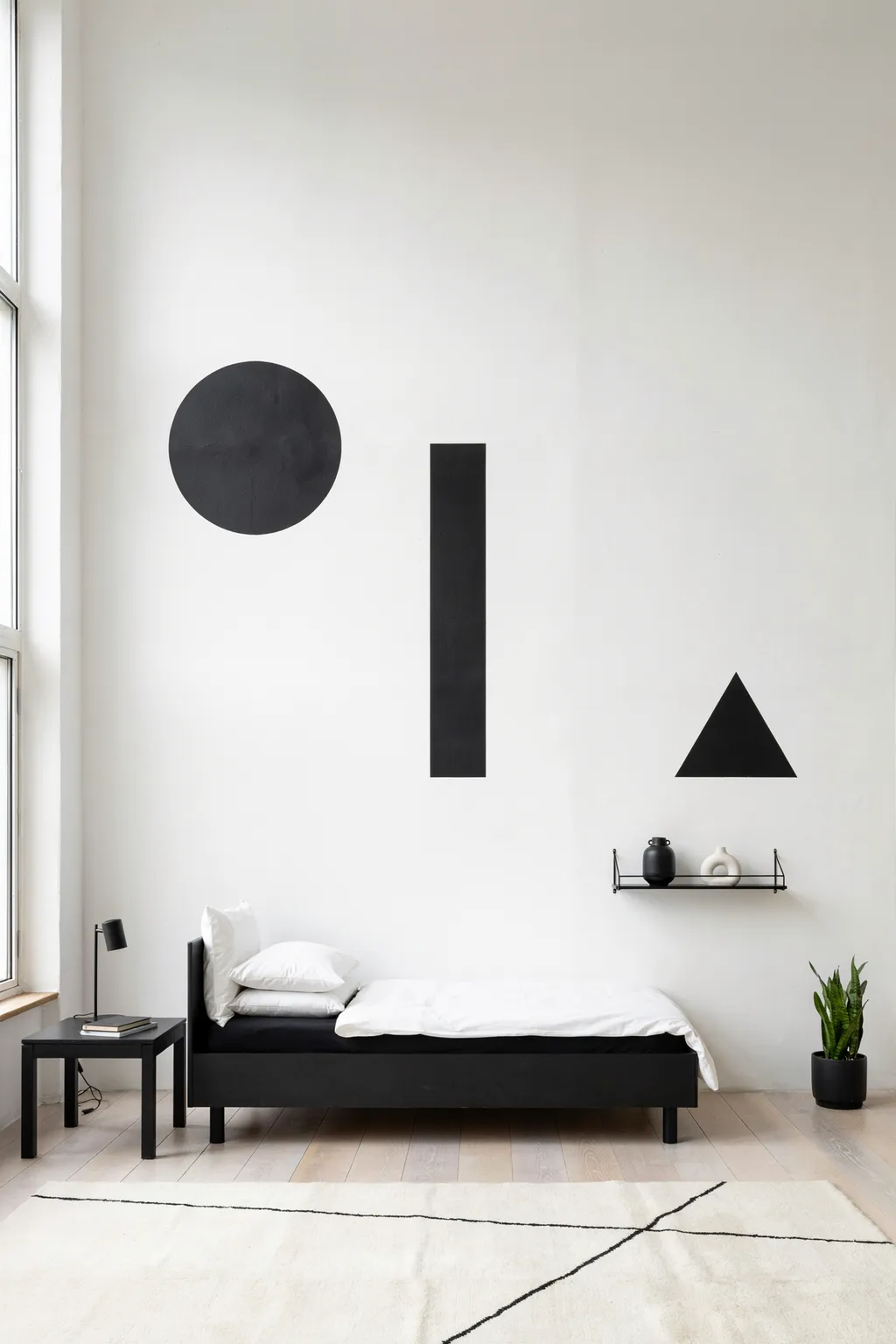 Bold Monochrome Wall in a Minimalist Bedroom