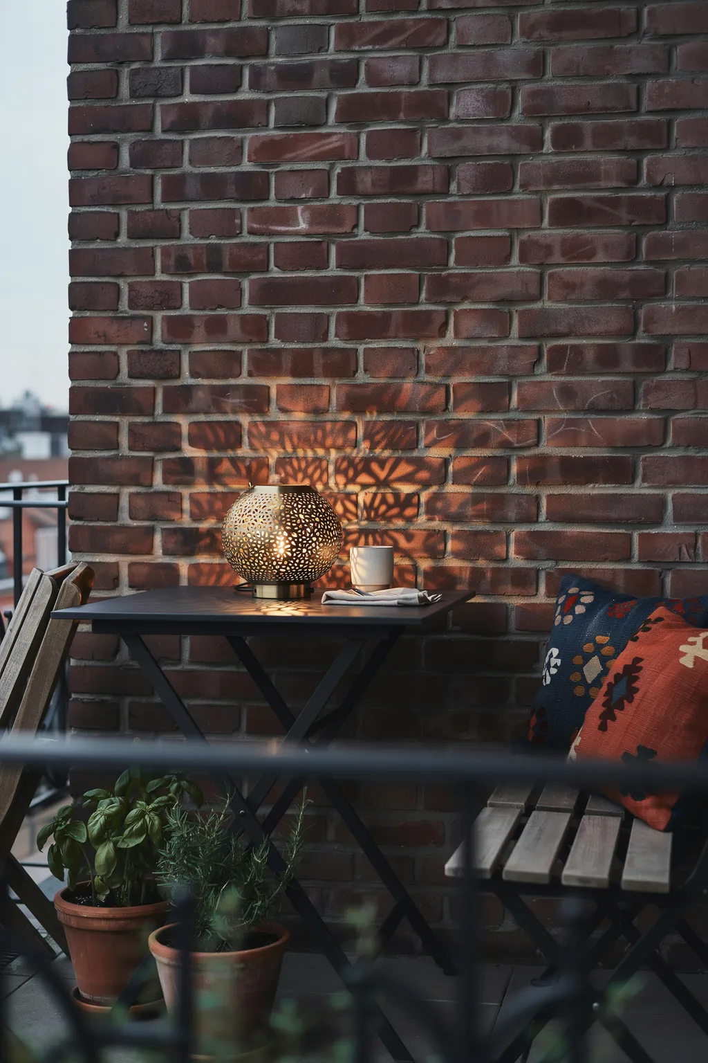 Compact Dining Spot for Two on a Balcony