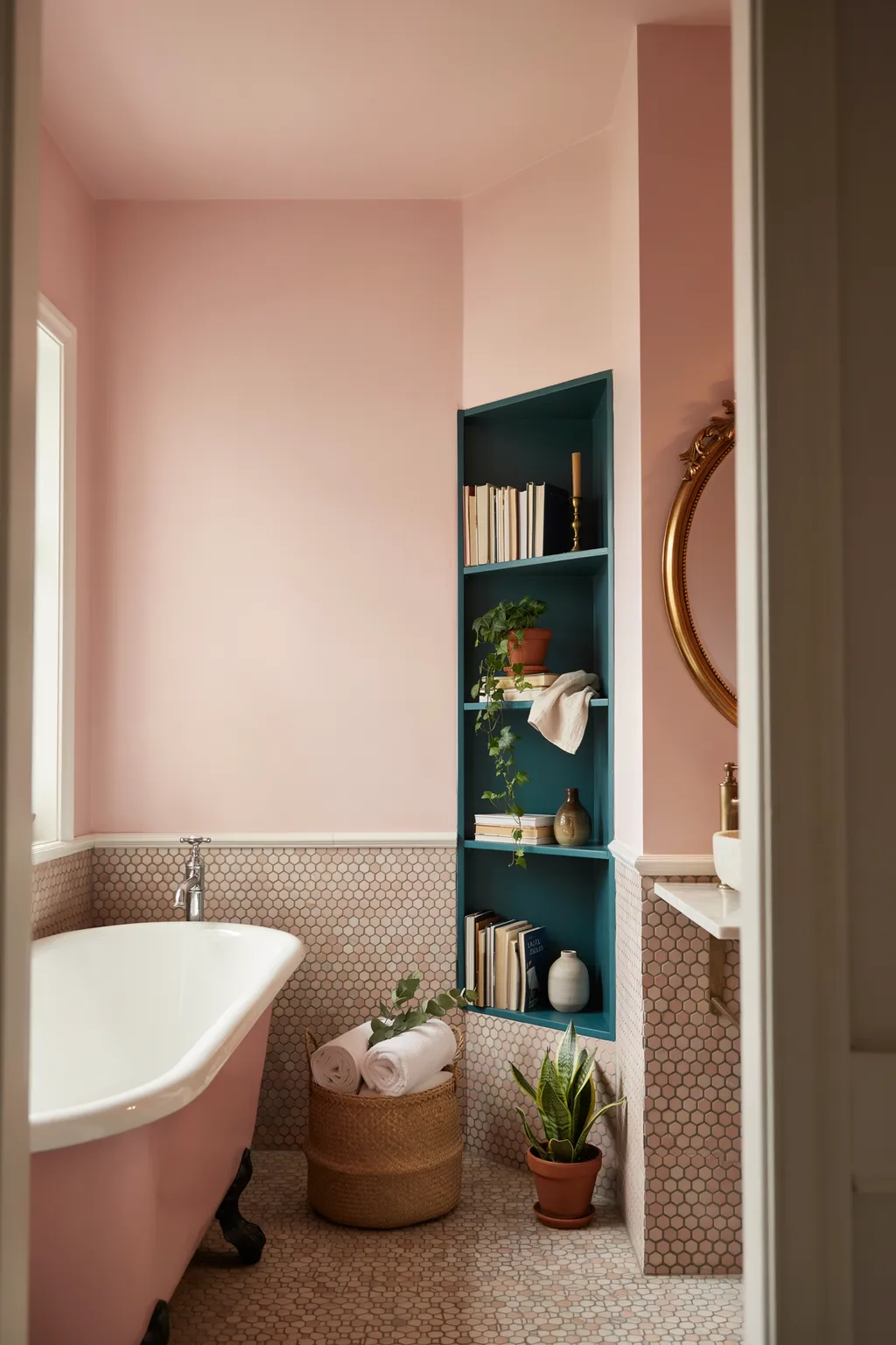 Pink Bathroom With Teal Built-In Shelving