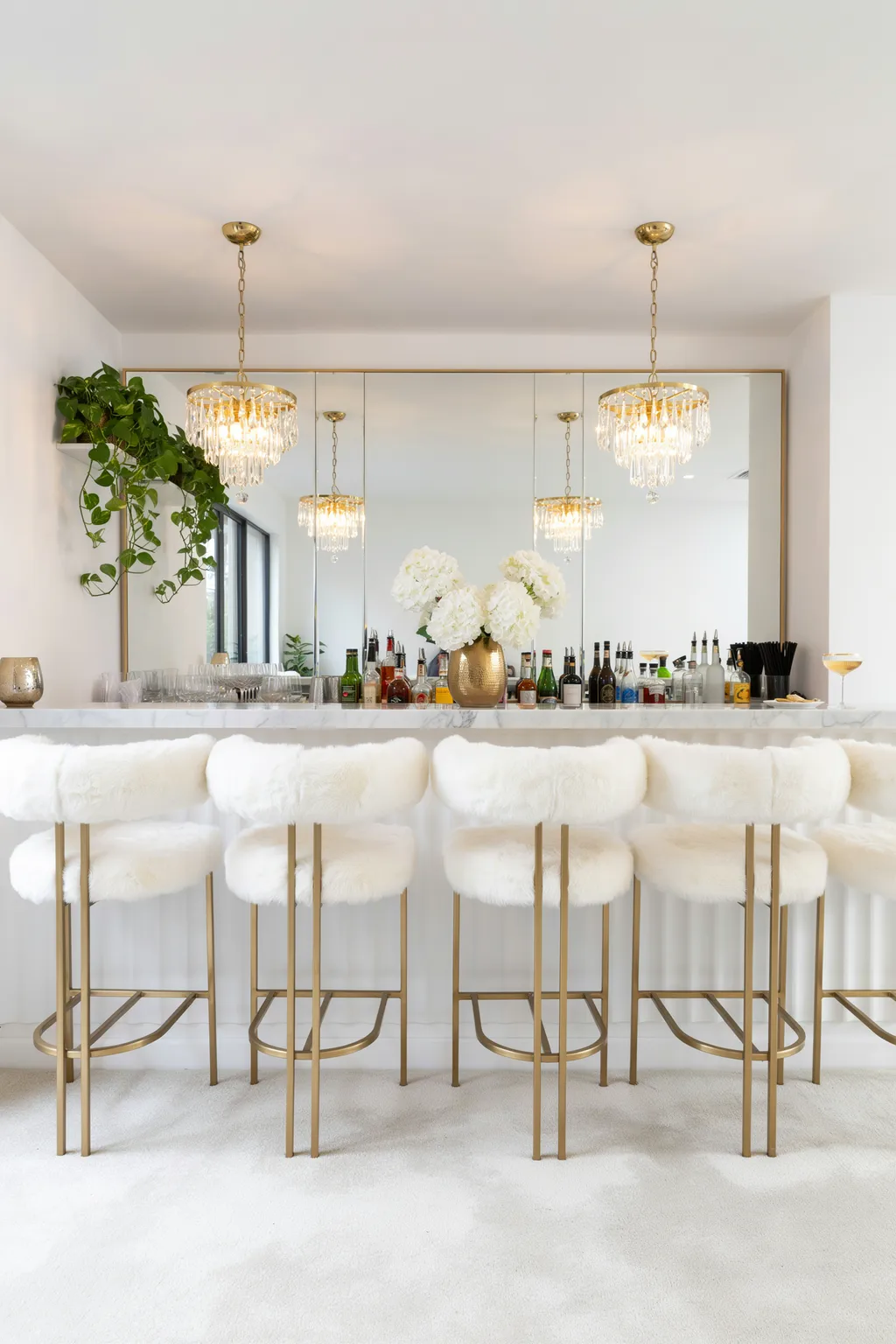 Faux-Fur Gold Stools For A Glam Bar