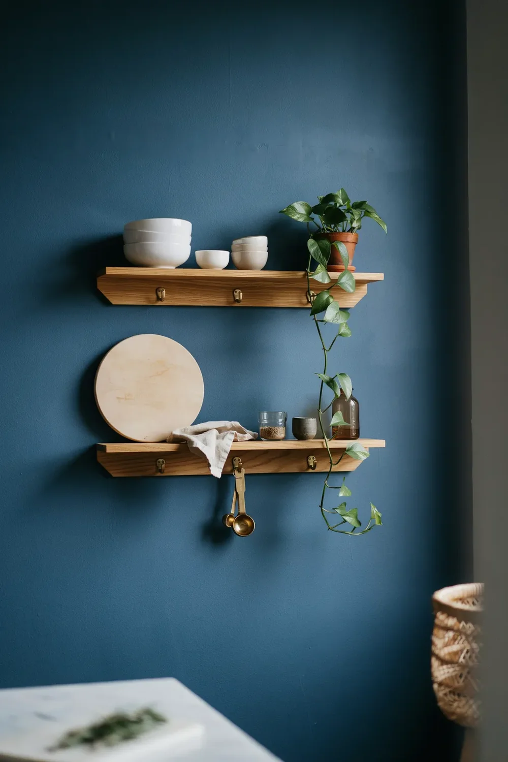 Open Shelves on a Blue Wall