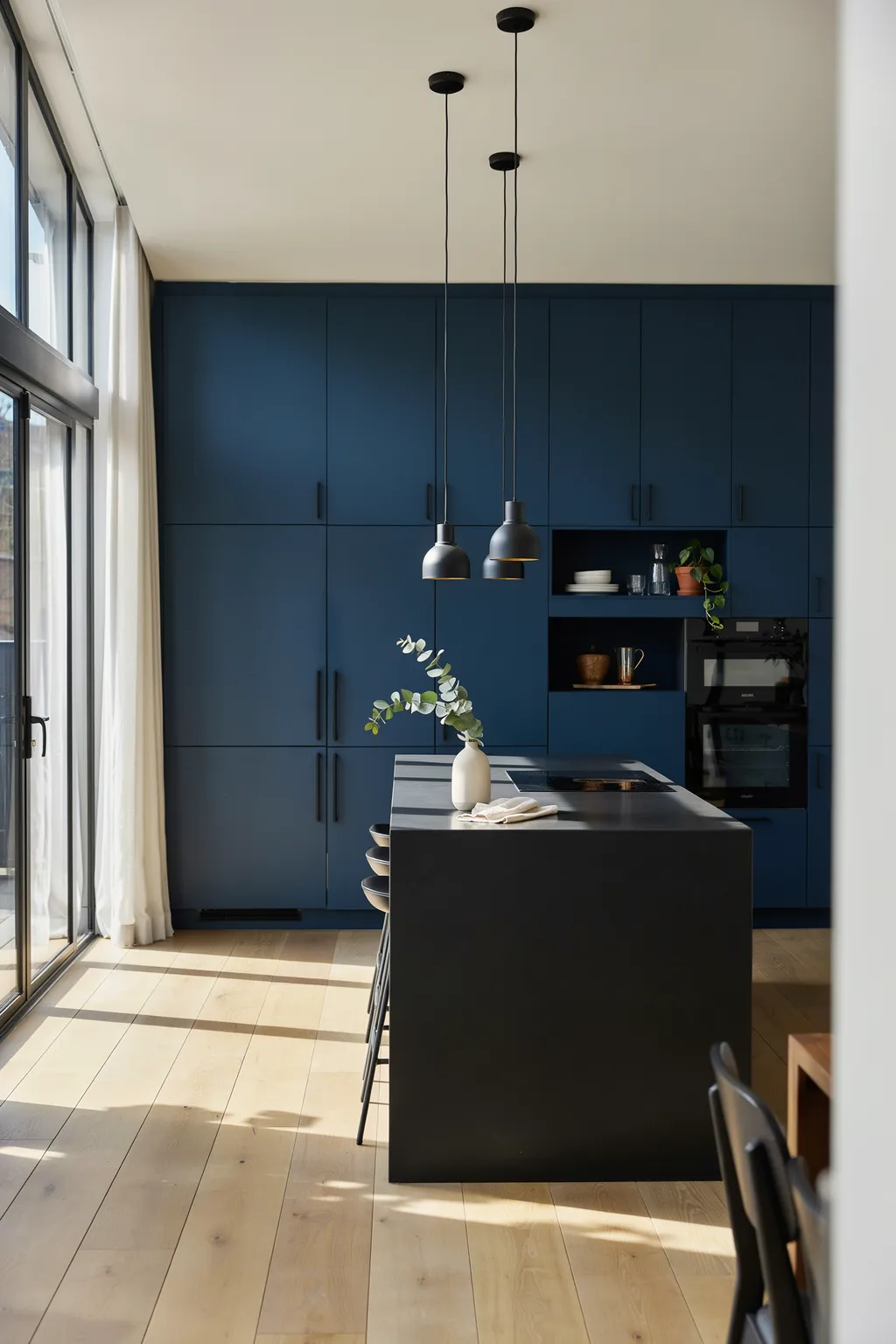 All-Navy Modern Flat-Panel Kitchen with Black Hardware