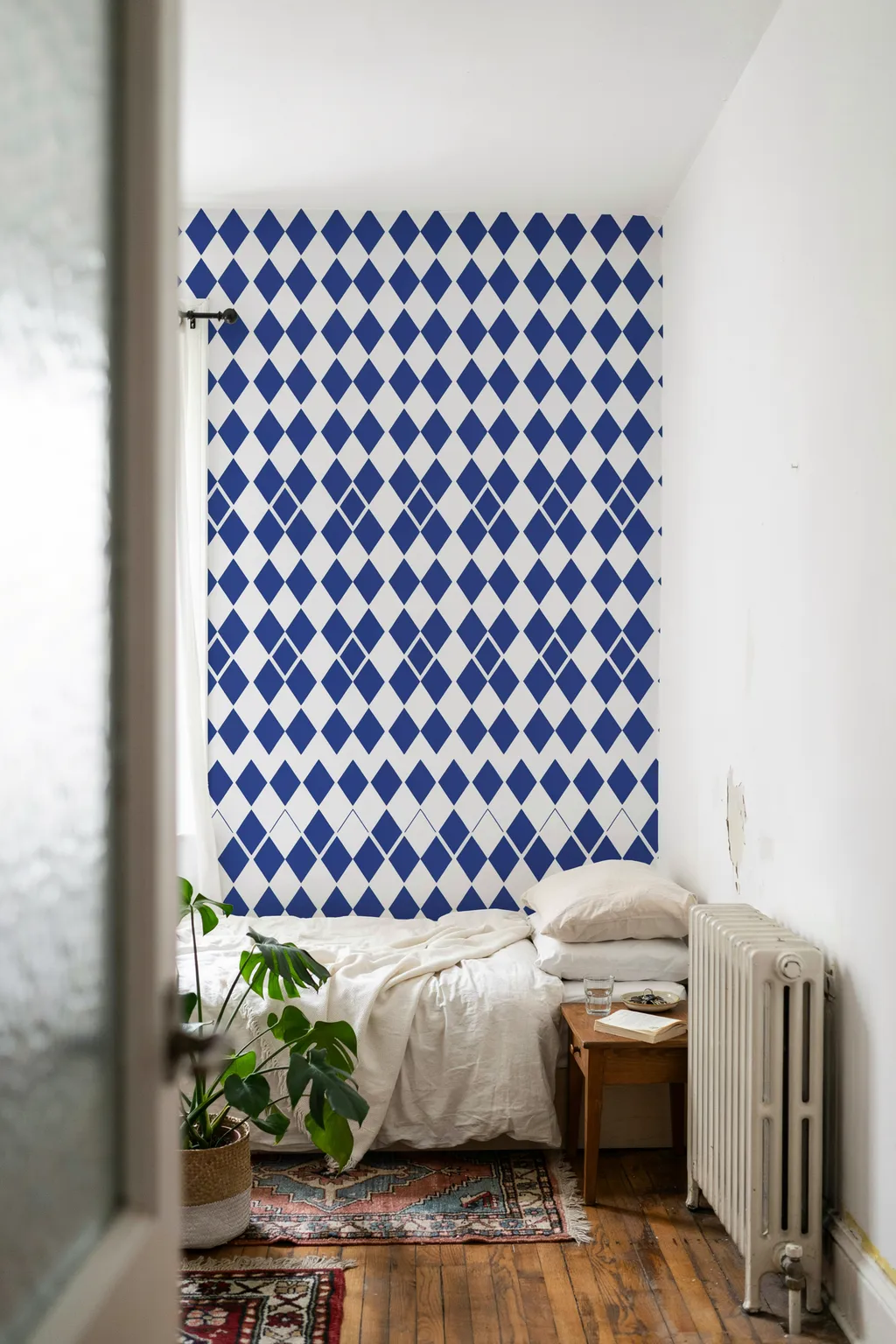 Use Peel-and-Stick Wallpaper Behind the Bed If You Rent