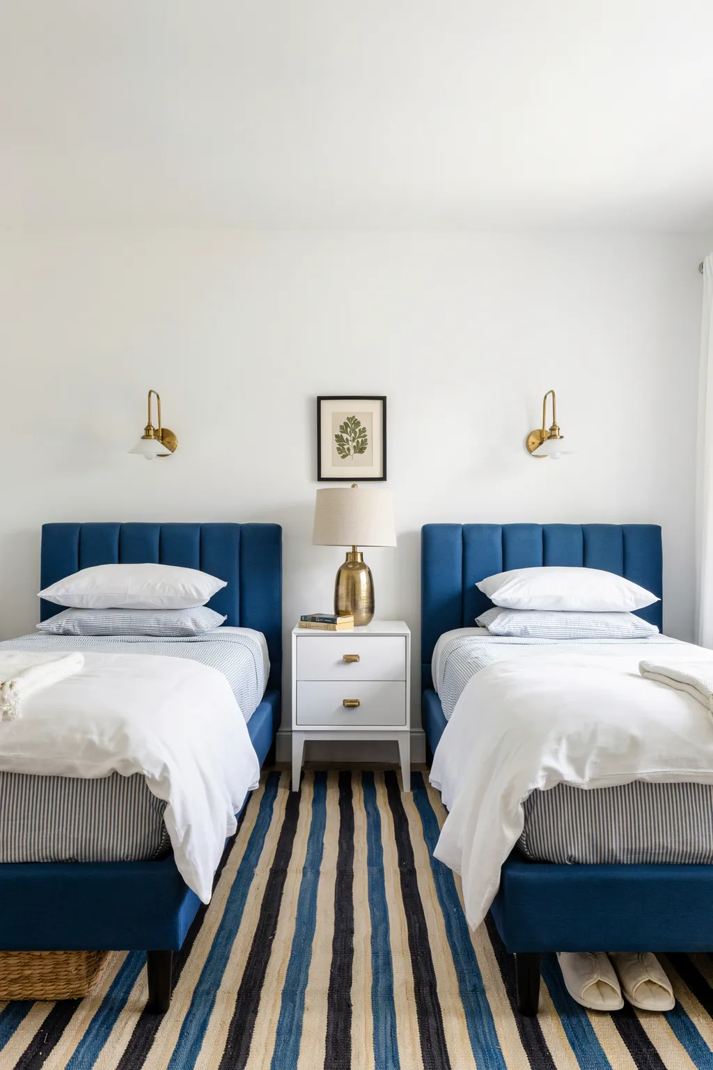 Line Up a Shared Room With Two Matching Blue Headboards